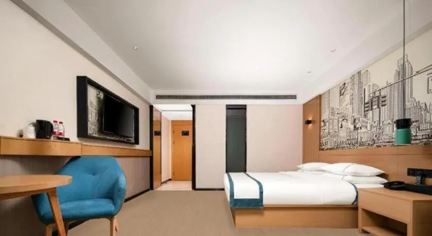 Bed in City Comfort Inn Yuzhou Yuwang Square