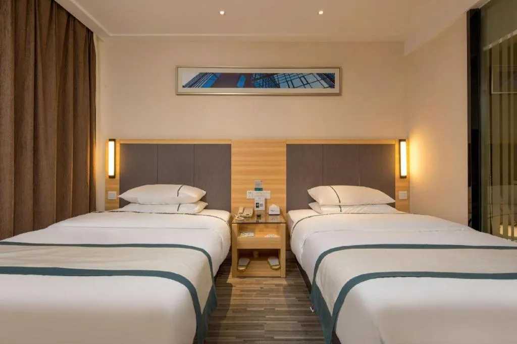 Bed in City Comfort Inn Dongguan Nancheng Tian'an Digital City