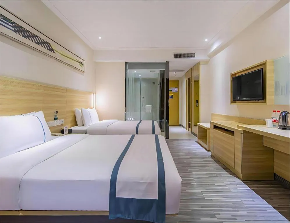 Bed in City Comfort Inn Dongguan Nancheng Tian'an Digital City