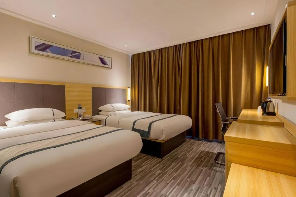 Bed in City Comfort Inn Dongguan Nancheng Tian'an Digital City