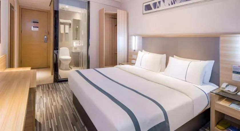 Bed in City Comfort Inn Maoming High Speed Railway Station Wenming Road