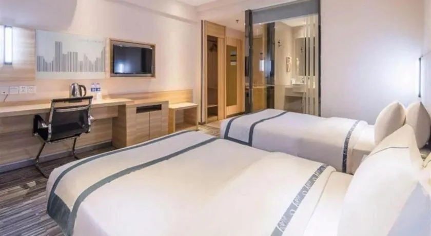 Bed in City Comfort Inn Maoming High Speed Railway Station Wenming Road