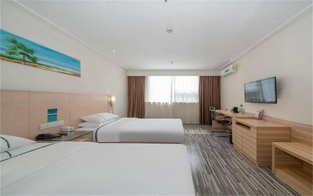 Bed in City Comfort Inn Maoming High Speed Railway Station Wenming Road