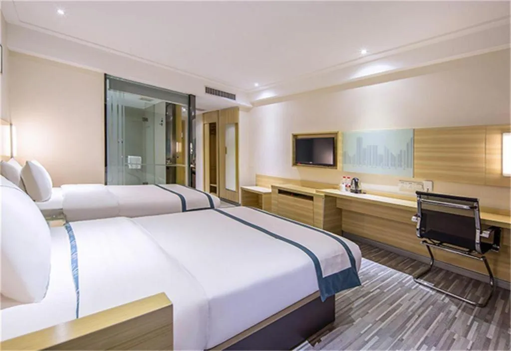 Bed in City Comfort Inn Maoming High Speed Railway Station Wenming Road
