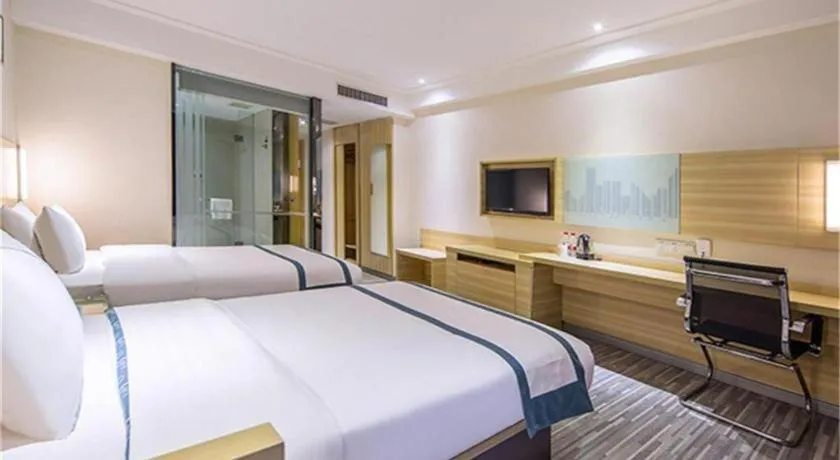 Bed in City Comfort Inn Maoming High Speed Railway Station Wenming Road