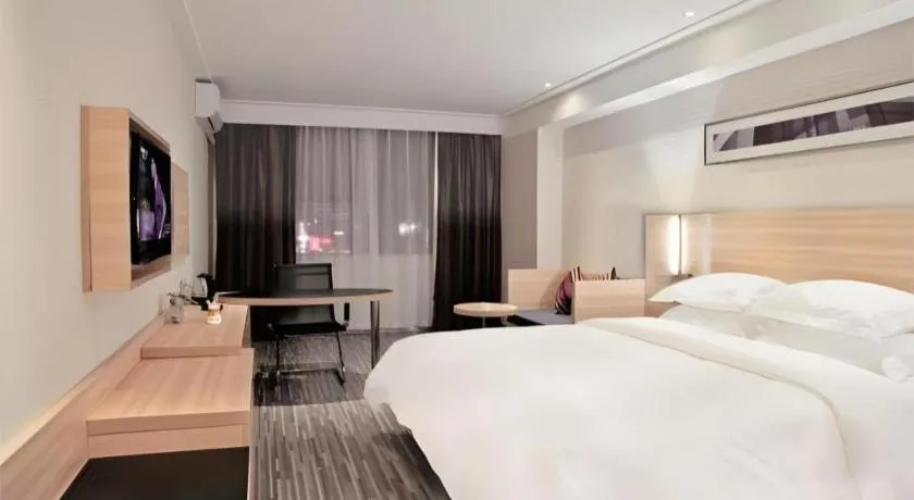 Bed in City Comfort Inn Wuhan Rui'an Street Metro Station