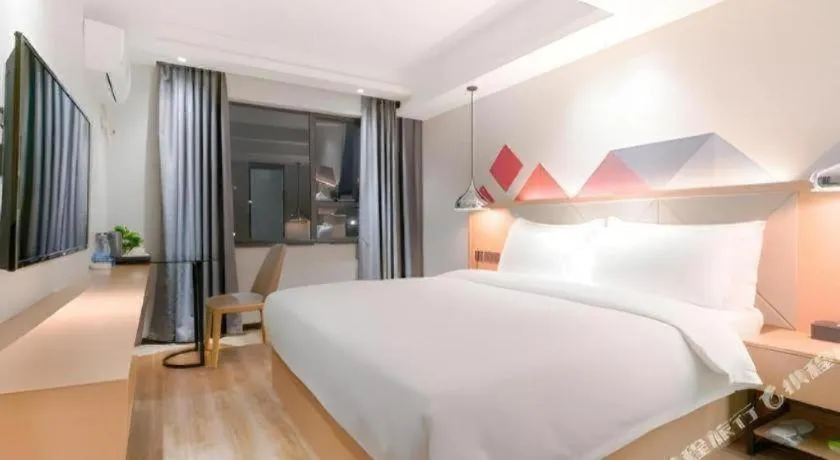 Bed in Borrman Hotel Zhuhai Gongbei Port Fuhuali Light Rail