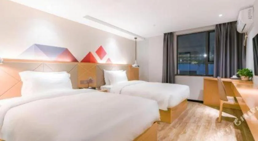 Bed in Borrman Hotel Zhuhai Gongbei Port Fuhuali Light Rail