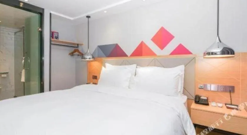 Bed in Borrman Hotel Zhuhai Gongbei Port Fuhuali Light Rail