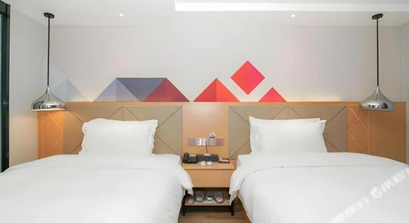 Bed in Borrman Hotel Zhuhai Gongbei Port Fuhuali Light Rail