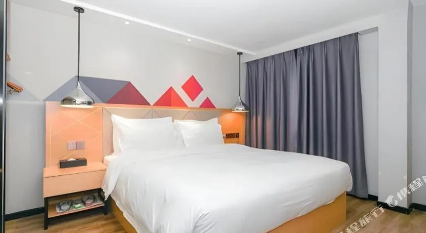 Bed in Borrman Hotel Zhuhai Gongbei Port Fuhuali Light Rail