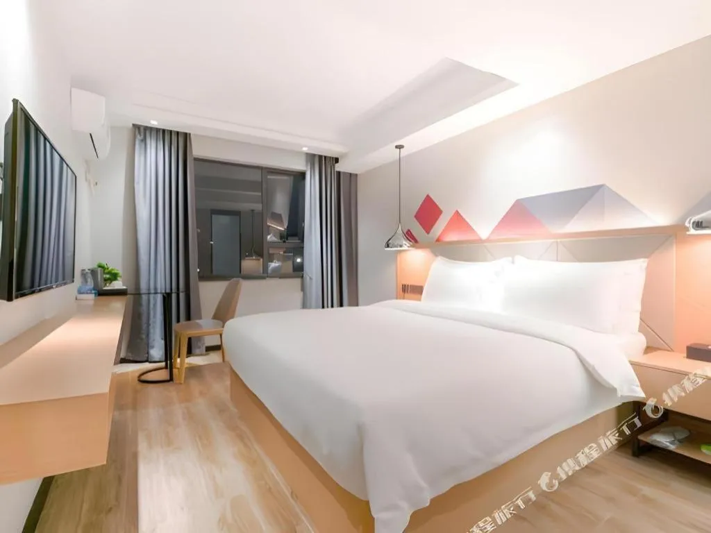 Bed in Borrman Hotel Zhuhai Gongbei Port Fuhuali Light Rail