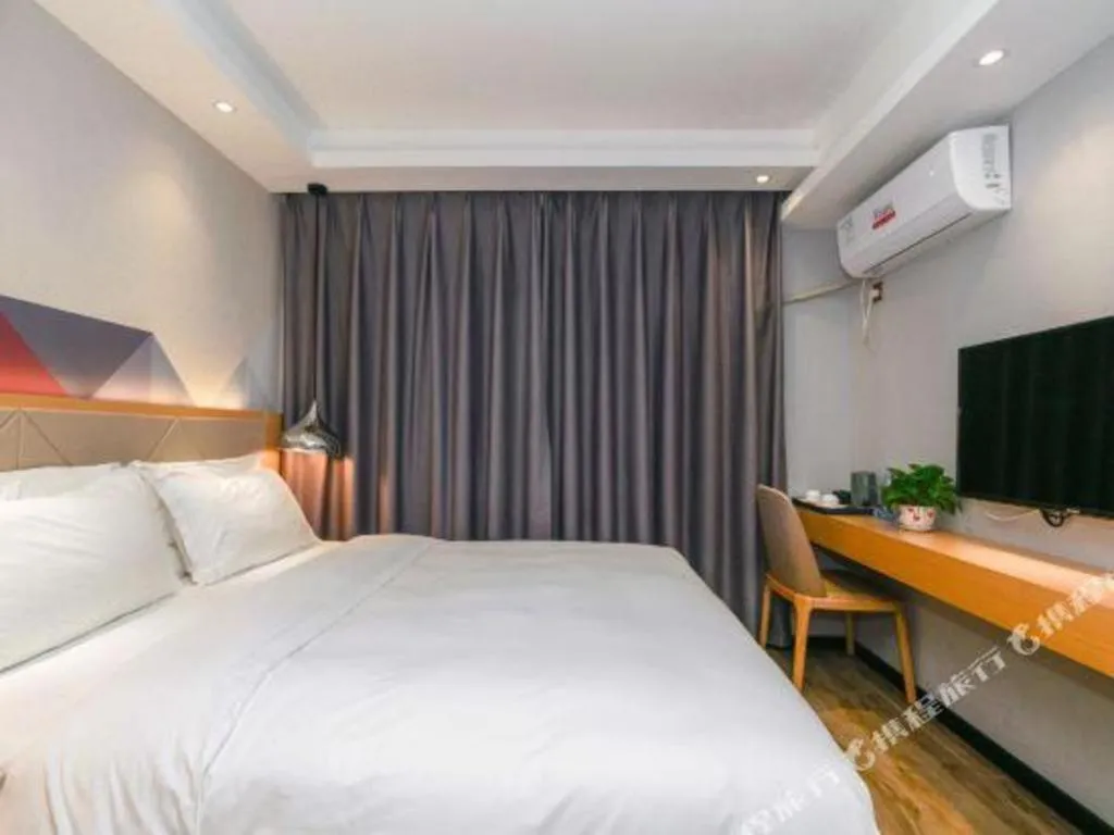 Bed in Borrman Hotel Zhuhai Gongbei Port Fuhuali Light Rail