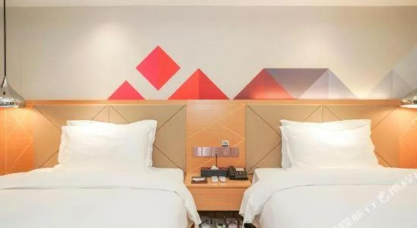 Bed in Borrman Hotel Zhuhai Gongbei Port Fuhuali Light Rail