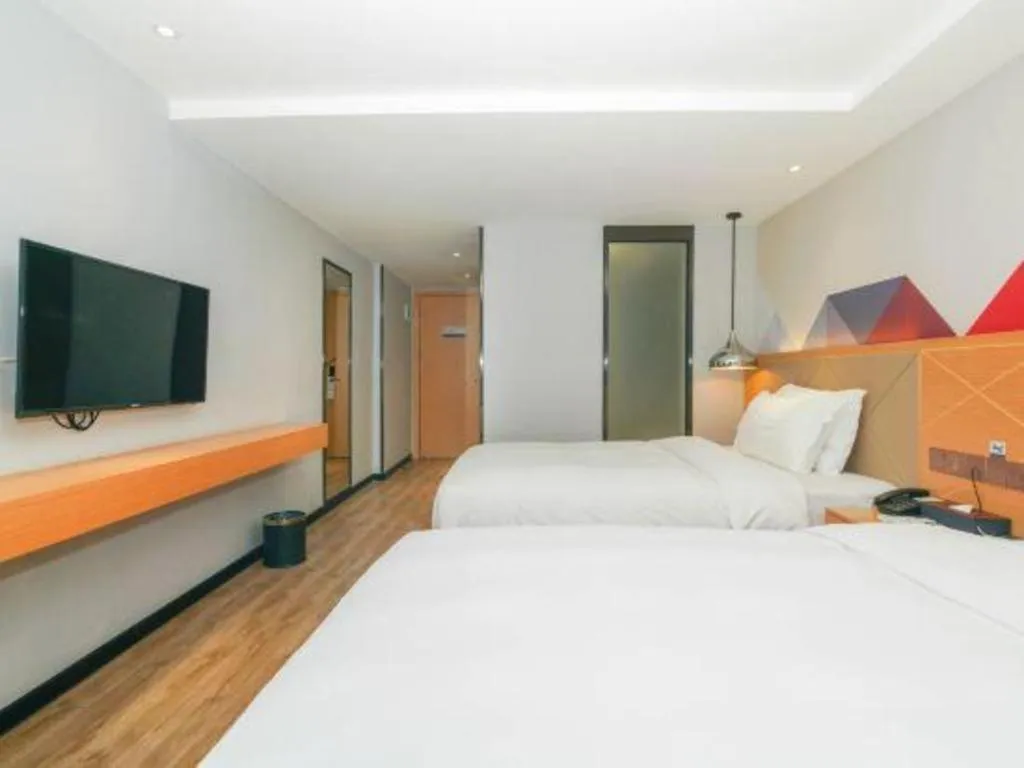 Bed in Borrman Hotel Zhuhai Gongbei Port Fuhuali Light Rail