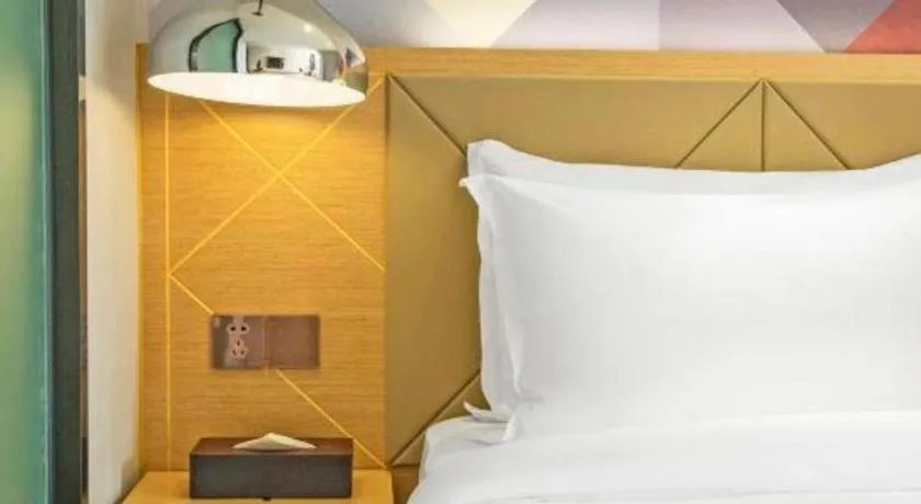 Bed in Borrman Hotel Zhuhai Gongbei Port Fuhuali Light Rail