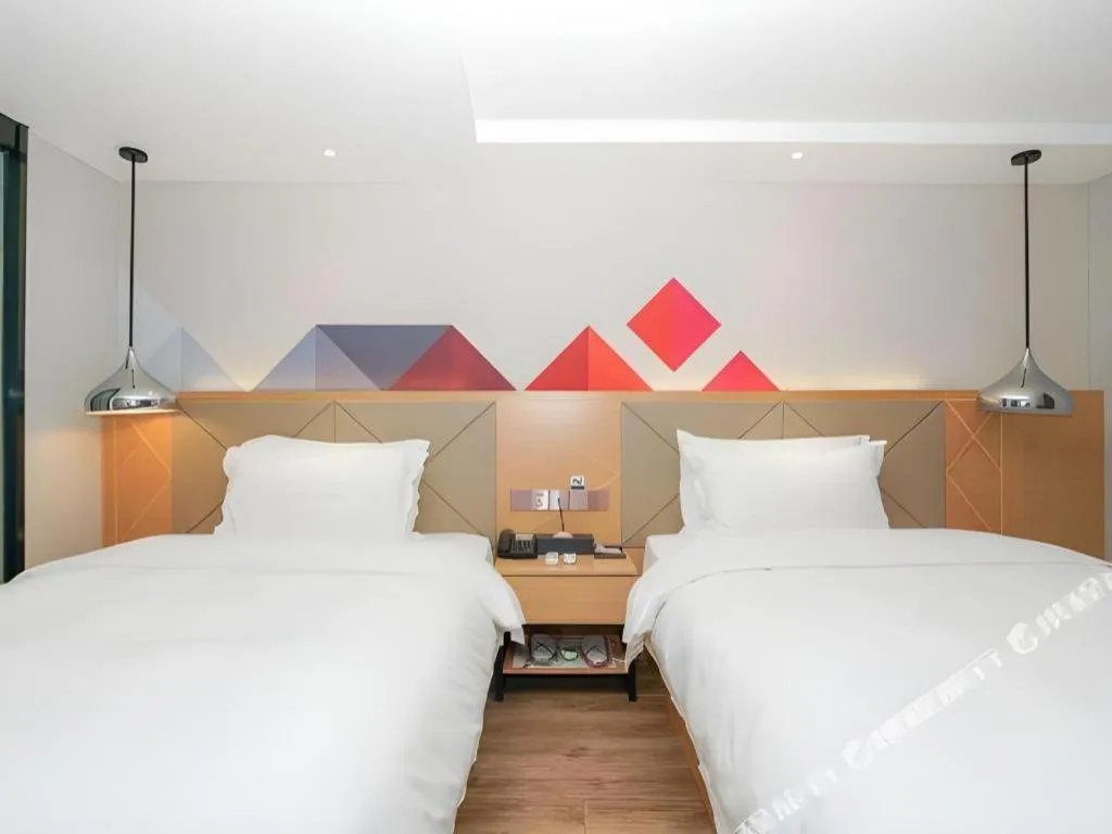 Bed in Borrman Hotel Zhuhai Gongbei Port Fuhuali Light Rail