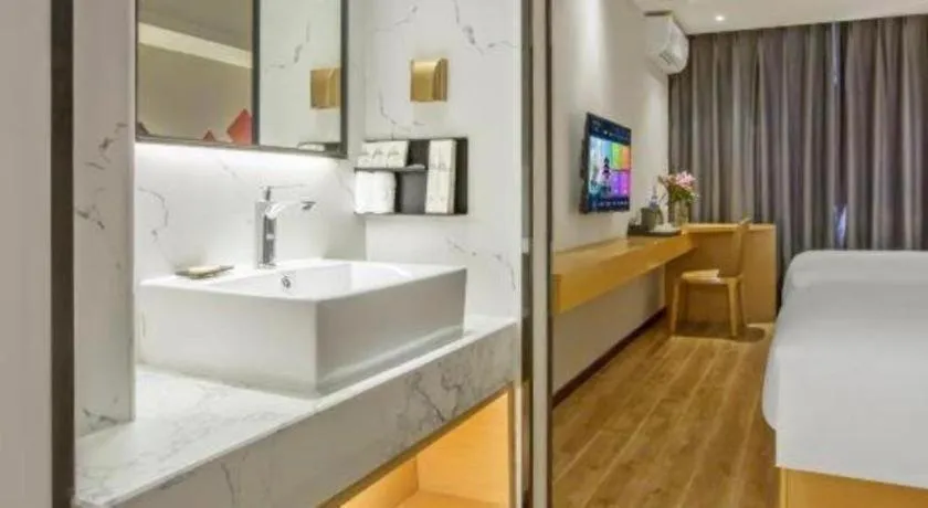 Bed in Borrman Hotel Zhuhai Gongbei Port Fuhuali Light Rail