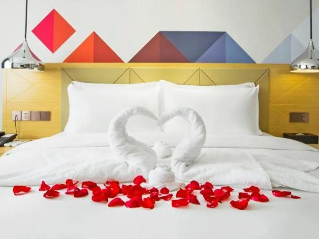 Bed in Borrman Hotel Zhuhai Gongbei Port Fuhuali Light Rail