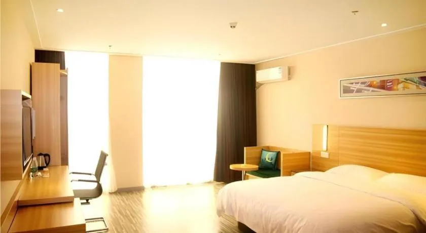 Bed in City Comfort Inn Qianjiang Longxiacheng
