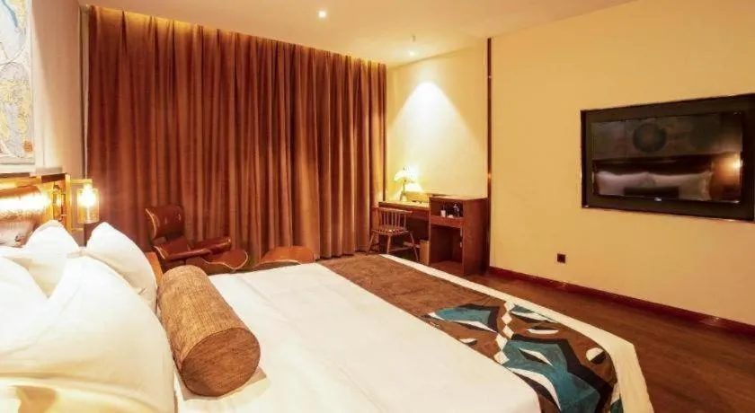 Bed in James Joyce Coffetel· Yinchuan International Exhibition Center Wanda Square Qinshui Street