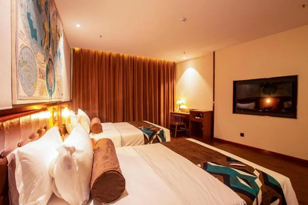 Bed in James Joyce Coffetel· Yinchuan International Exhibition Center Wanda Square Qinshui Street