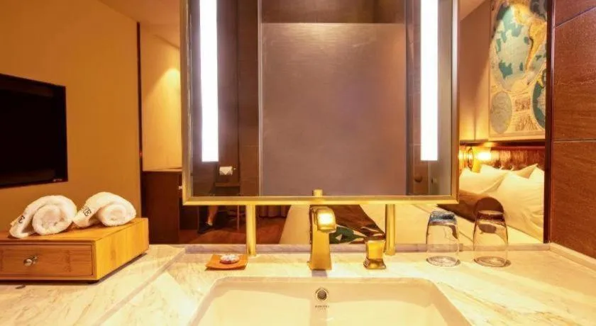 Bed in James Joyce Coffetel· Yinchuan International Exhibition Center Wanda Square Qinshui Street