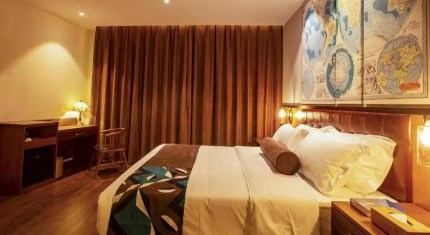 Bed in James Joyce Coffetel· Yinchuan International Exhibition Center Wanda Square Qinshui Street