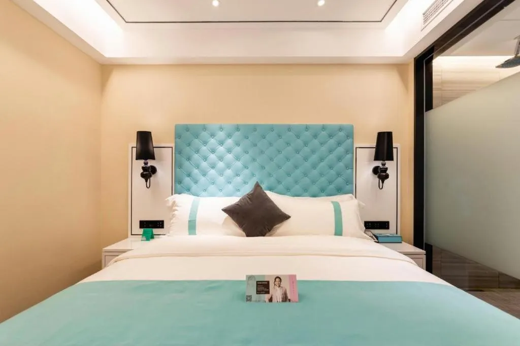 Bed in Xana Hotelle· Dalian Software Park University of Technology