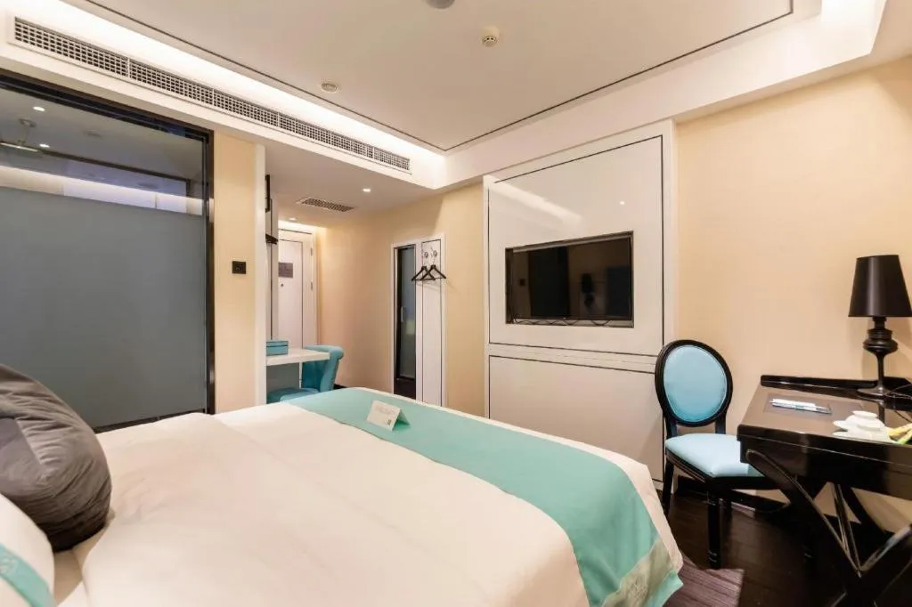 Bed in Xana Hotelle· Dalian Software Park University of Technology