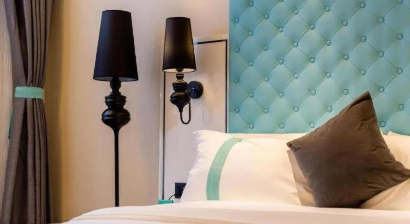 Bed in Xana Hotelle· Dalian Software Park University of Technology