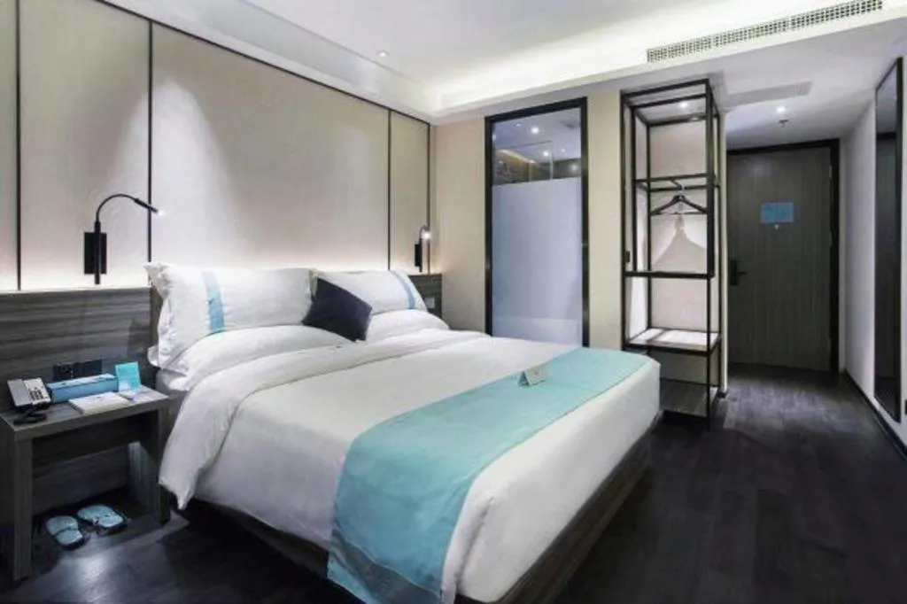 Bed in Xana Hotelle· Dalian Software Park University of Technology