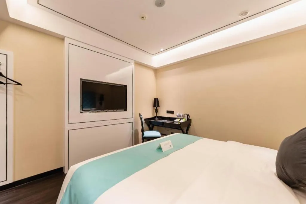 Bed in Xana Hotelle· Dalian Software Park University of Technology