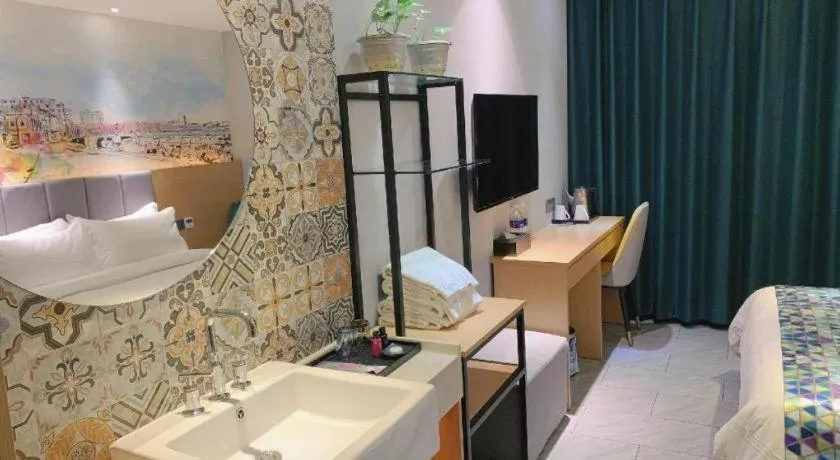 Bed in ZMAX Hotel Beijing Tongzhou Universal Tourist Resort Linheli Metro Station