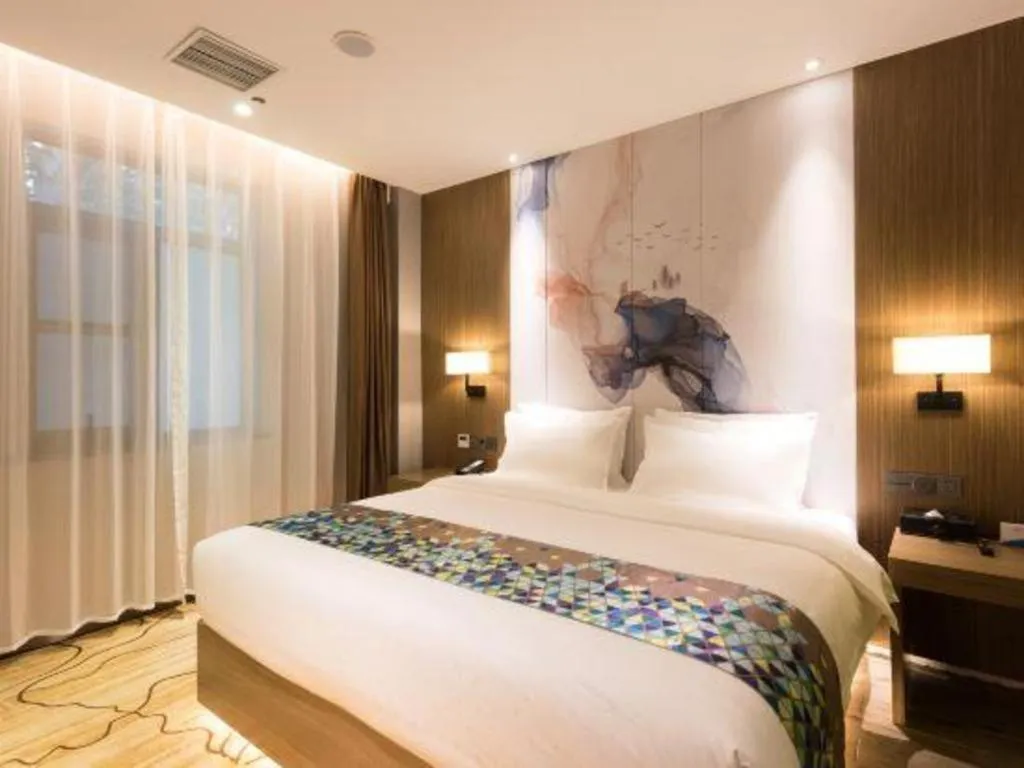 Bed in ZMAX Hotel Beijing Tongzhou Universal Tourist Resort Linheli Metro Station