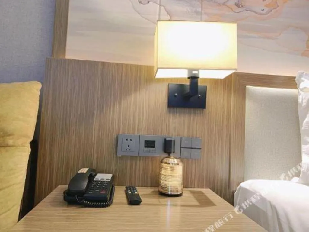 Bed in ZMAX Hotel Beijing Tongzhou Universal Tourist Resort Linheli Metro Station