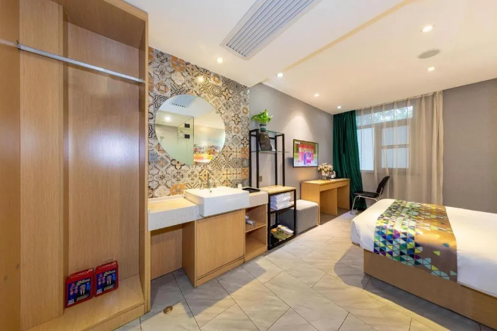 Bed in ZMAX Hotel Beijing Tongzhou Universal Tourist Resort Linheli Metro Station