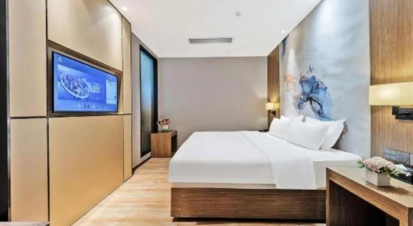 Bed in ZMAX Hotel Beijing Tongzhou Universal Tourist Resort Linheli Metro Station