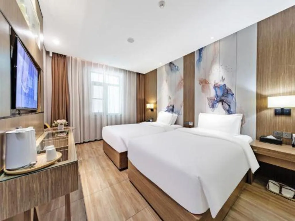 Bed in ZMAX Hotel Beijing Tongzhou Universal Tourist Resort Linheli Metro Station