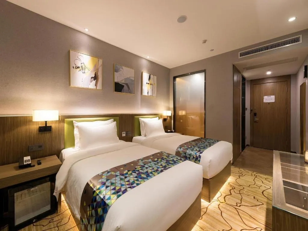 Bed in ZMAX Hotel Beijing Tongzhou Universal Tourist Resort Linheli Metro Station