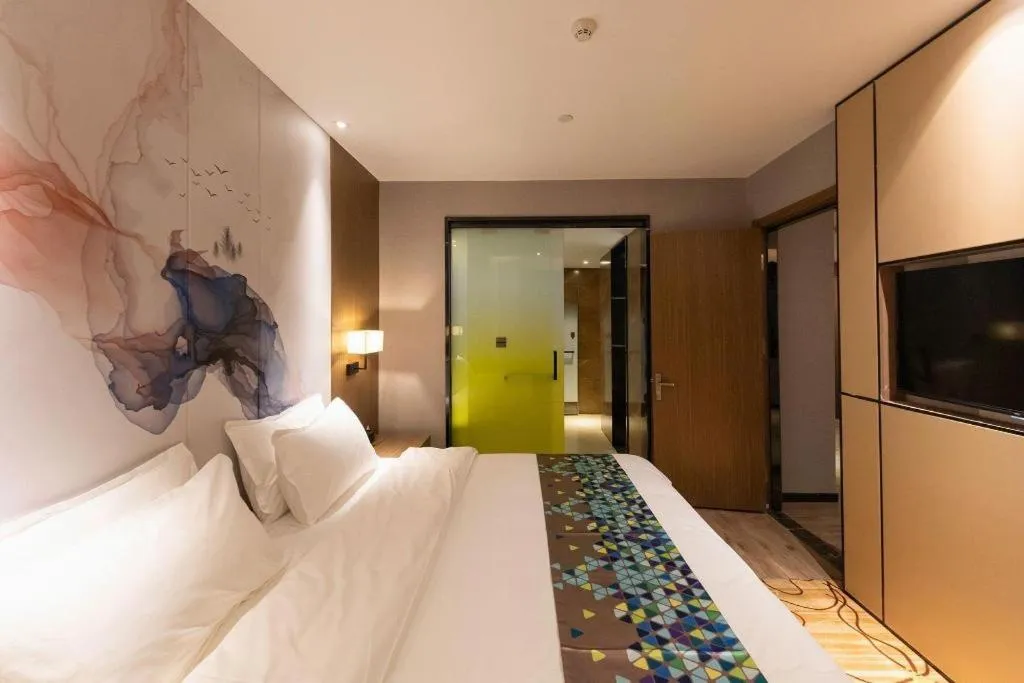 Bed in ZMAX Hotel Beijing Tongzhou Universal Tourist Resort Linheli Metro Station