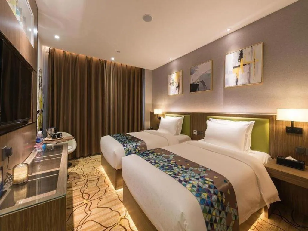 Bed in ZMAX Hotel Beijing Tongzhou Universal Tourist Resort Linheli Metro Station