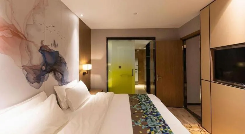 Bed in ZMAX Hotel Beijing Tongzhou Universal Tourist Resort Linheli Metro Station