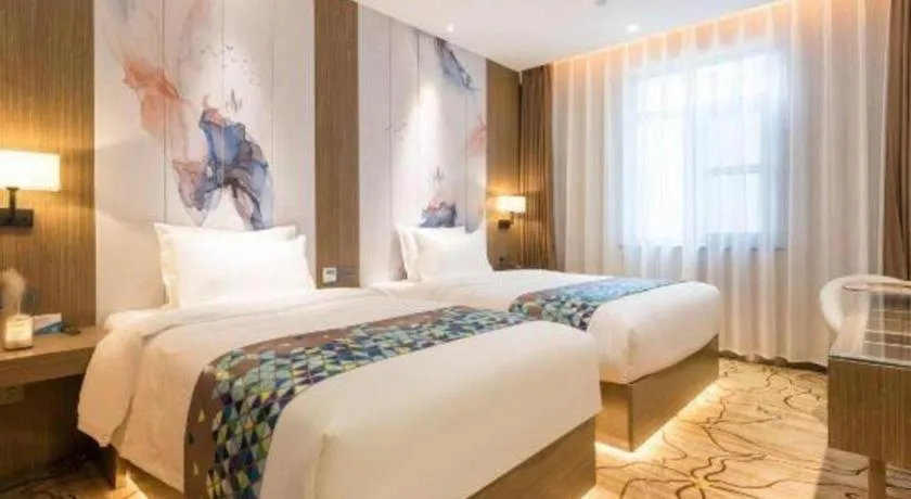 Bed in ZMAX Hotel Beijing Tongzhou Universal Tourist Resort Linheli Metro Station