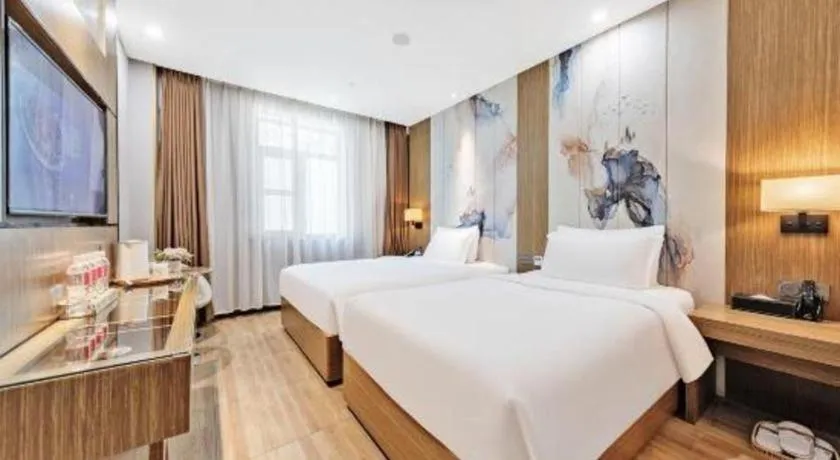 Bed in ZMAX Hotel Beijing Tongzhou Universal Tourist Resort Linheli Metro Station