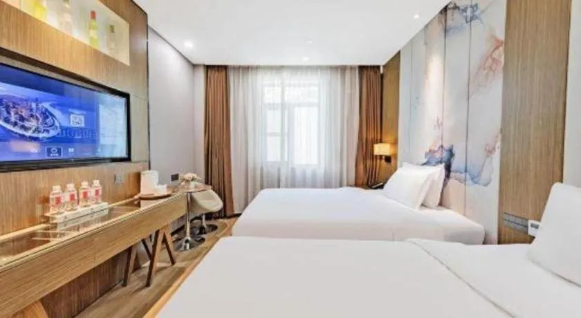 Bed in ZMAX Hotel Beijing Tongzhou Universal Tourist Resort Linheli Metro Station