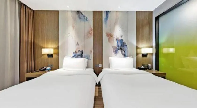 Bed in ZMAX Hotel Beijing Tongzhou Universal Tourist Resort Linheli Metro Station