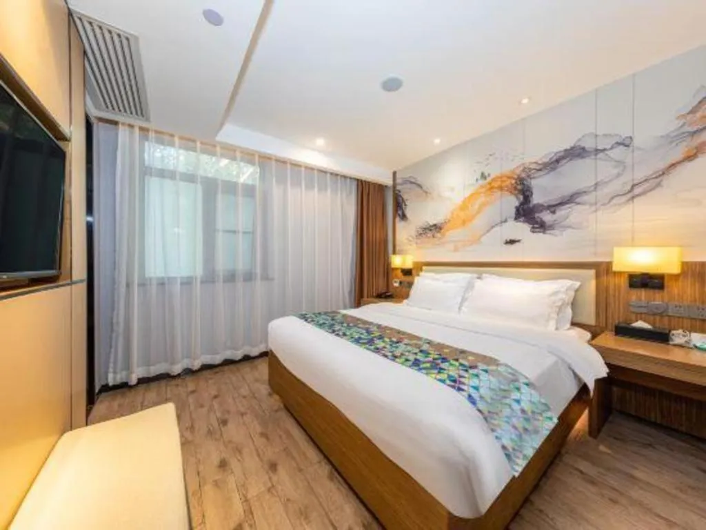 Bed in ZMAX Hotel Beijing Tongzhou Universal Tourist Resort Linheli Metro Station
