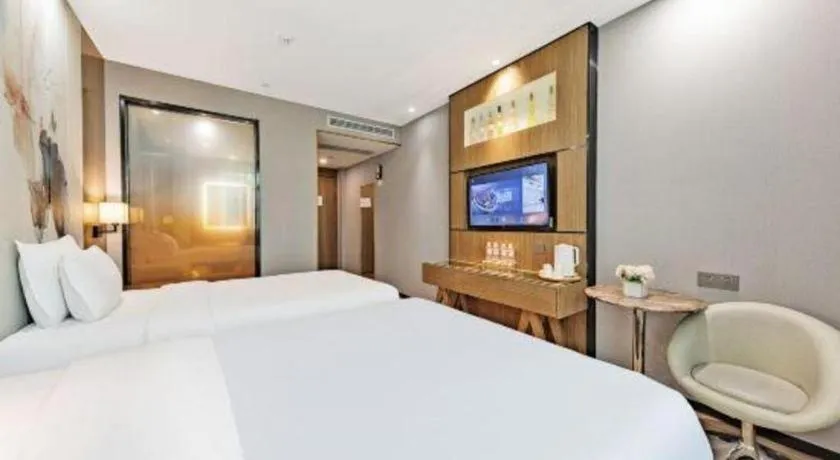Bed in ZMAX Hotel Beijing Tongzhou Universal Tourist Resort Linheli Metro Station