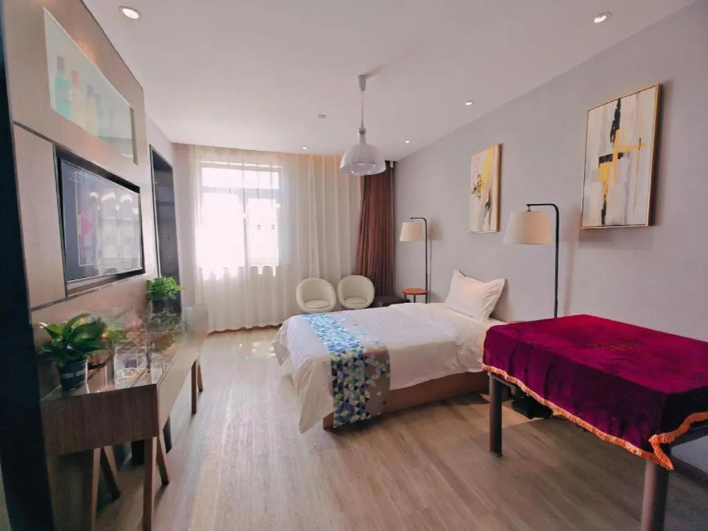 Bed in ZMAX Hotel Beijing Tongzhou Universal Tourist Resort Linheli Metro Station